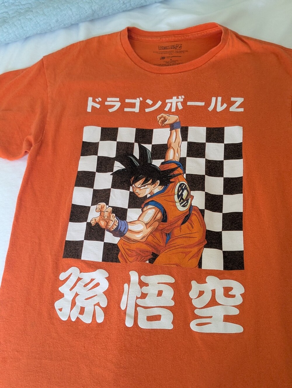 Dragon Ball Z  Mens T-Shirt - Goku Captured on Checkerboard Kanji Medium